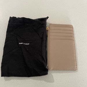New saint Laurent cassandre matelasse fragments zipped bi-fold wallet beige